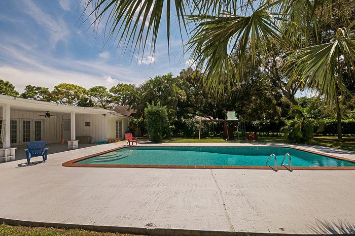 13387 Barwick Road Delray Beach, FL 33445 - Photo 28 of 28 a view of backyard with trampoline