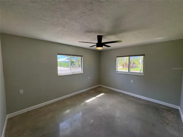 a view of a window in an empty room