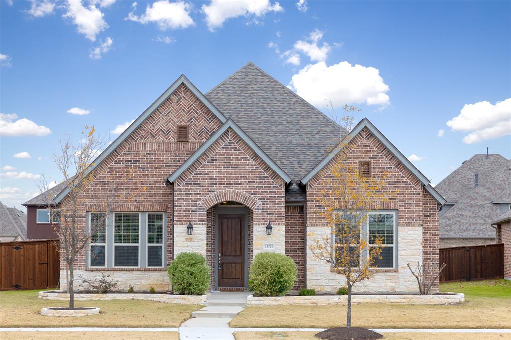 13749 Fieldcrest Road Frisco, TX 75035 - Photo 1 of 1 a front view of a house with garage