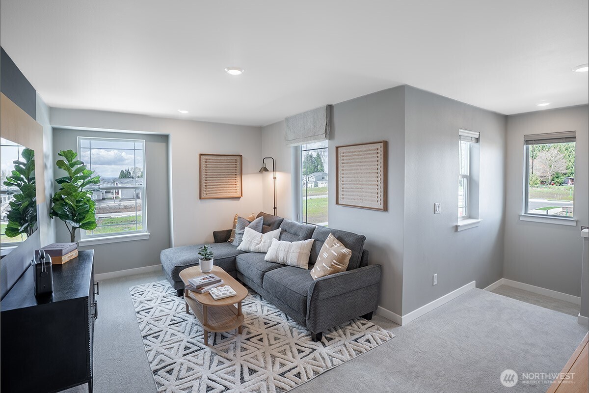 24318 13 Avenue Southeast, Unit CR10 Bothell, WA 98021 - Photo 3 of 6 a living room with furniture and a window