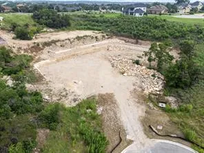 a view of a lake with a yard