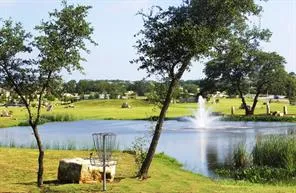 a view of a park with slide