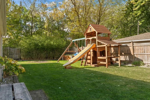 a view of a house with a big yard