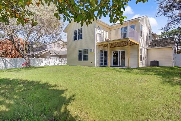 a view of a building with a yard