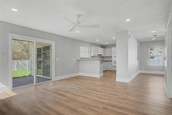 a view of kitchen with wooden floor