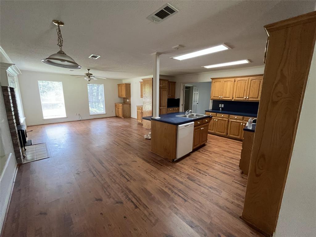 210 Vz County Road 2139 Canton, TX 75103 - Photo 18 of 18 a living room with stainless steel appliances kitchen island hardwood floor and a window