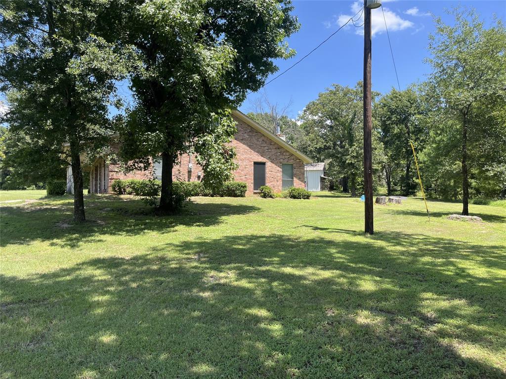 210 Vz County Road 2139 Canton, TX 75103 - Photo 4 of 18 a view of a tree in front of a house
