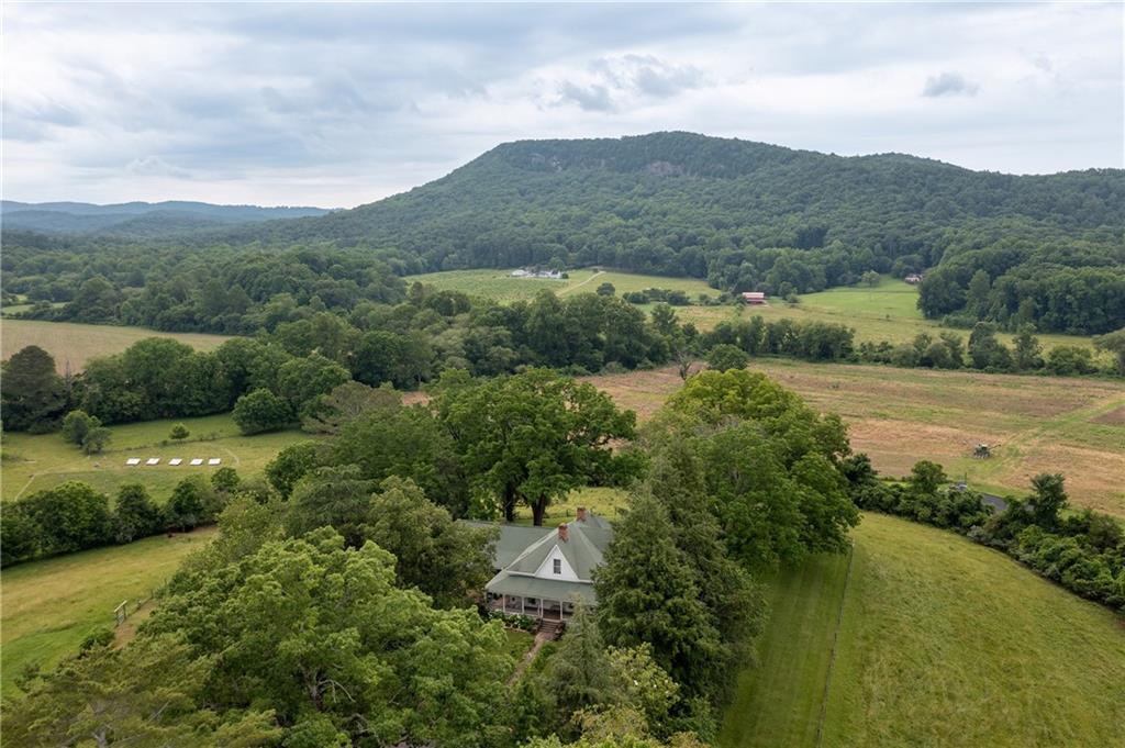 1526 Highway 255 Sautee Nacoochee, GA 30571 - Photo 13 of 61 a view of a town with mountains in the background