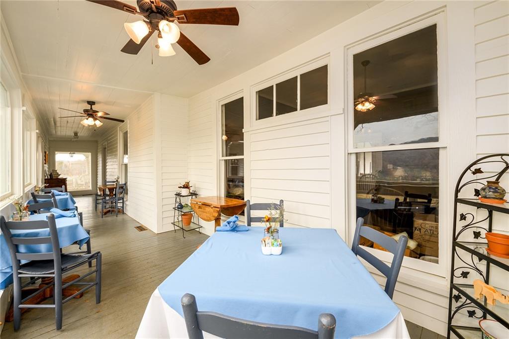 1526 Highway 255 Sautee Nacoochee, GA 30571 - Photo 25 of 61 a view of a dining room with furniture and chandelier