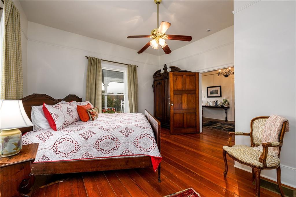 1526 Highway 255 Sautee Nacoochee, GA 30571 - Photo 32 of 61 a bedroom with a bed and wooden floor