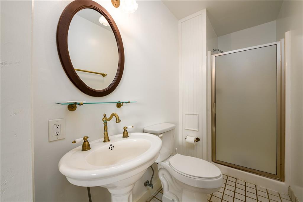 1526 Highway 255 Sautee Nacoochee, GA 30571 - Photo 34 of 61 a bathroom with a sink a toilet and a mirror