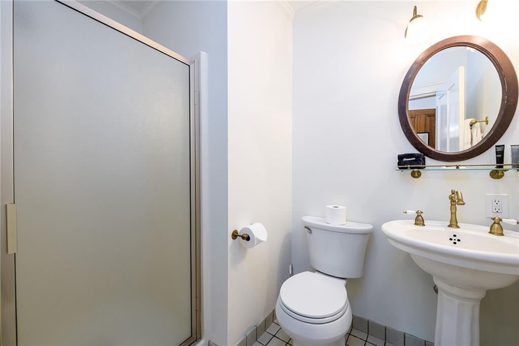 1526 Highway 255 Sautee Nacoochee, GA 30571 - Photo 42 of 61 a bathroom with a toilet a sink and a mirror