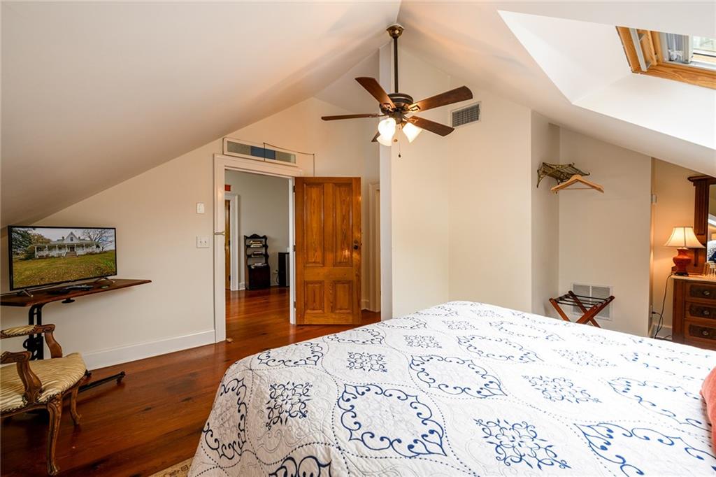 1526 Highway 255 Sautee Nacoochee, GA 30571 - Photo 48 of 61 a bedroom with a bed and a dresser