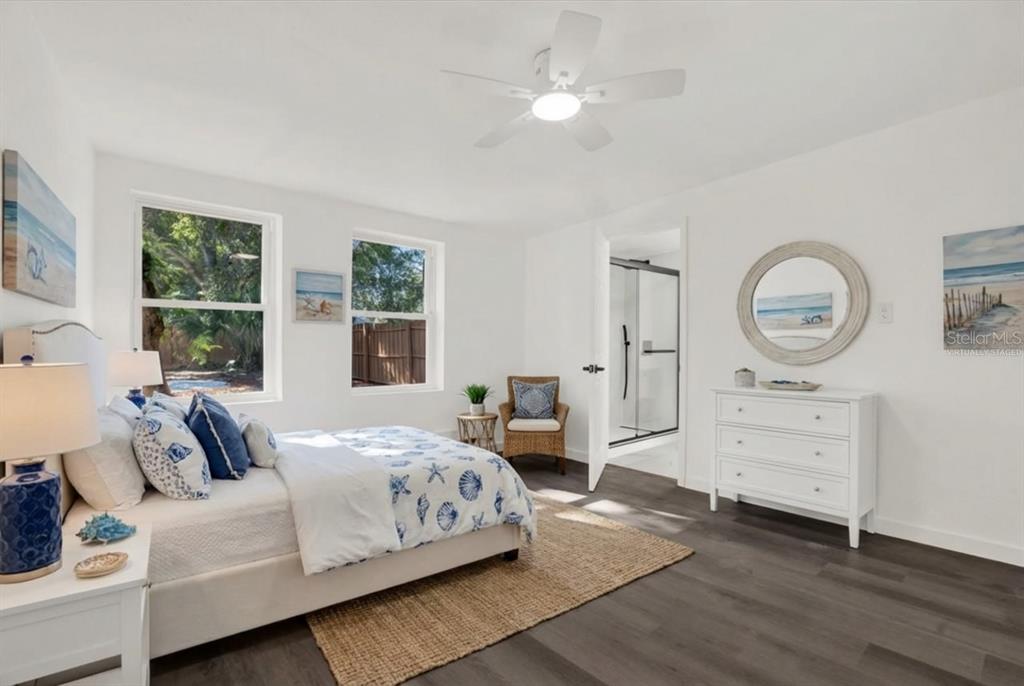 1955 Gilbert Street Clearwater, FL 33765 - Photo 11 of 24 a bedroom with a bed and a dresser