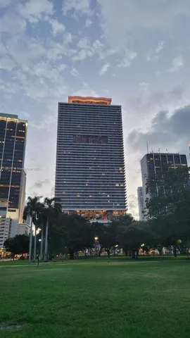 a view of swimming pool with outdoor seating
