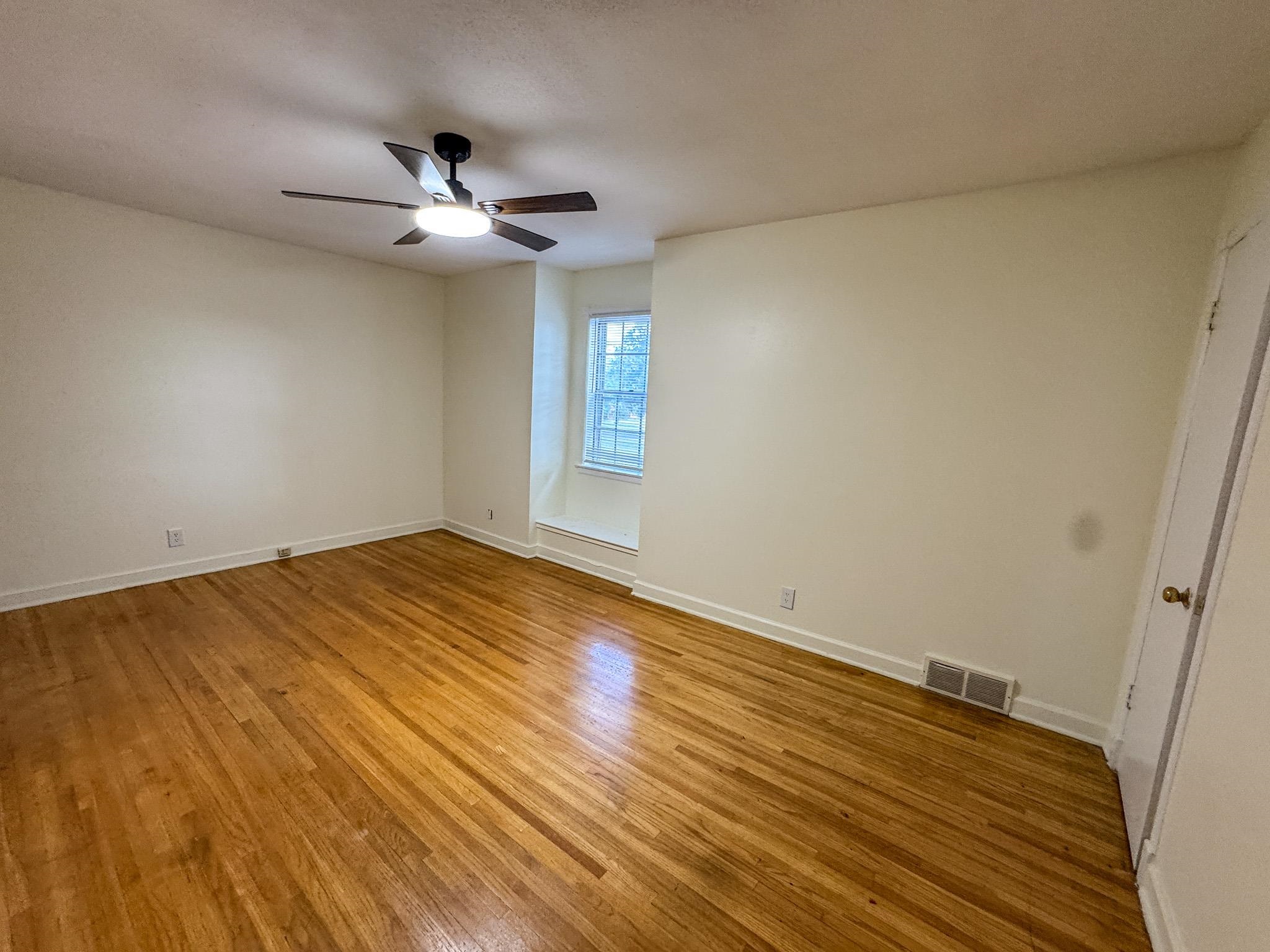 1345 Hickory Ridge Cove Memphis, TN 38116 - Photo 18 of 29 wooden floor in an empty room