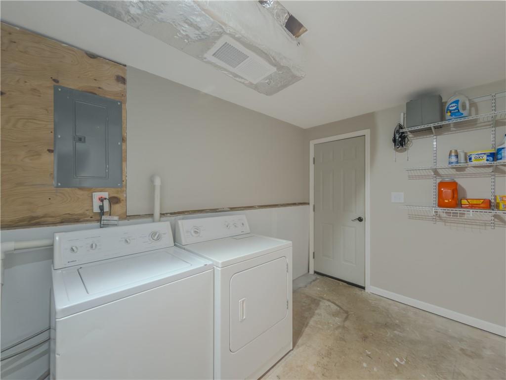 5728 Salem Road Lithonia, GA 30038 - Photo 30 of 35 a utility room with dryer and washer