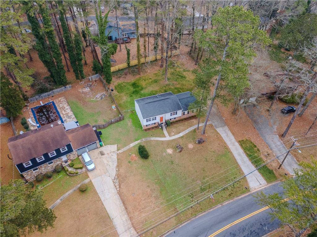 5728 Salem Road Lithonia, GA 30038 - Photo 34 of 35 an aerial view of a house with a swimming pool