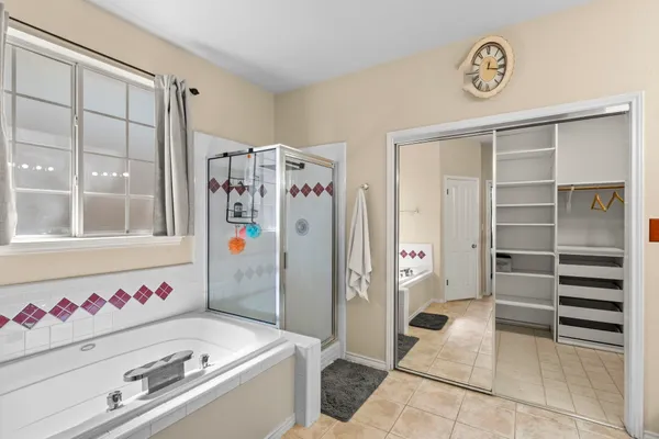 a room with a cabinet and a shower