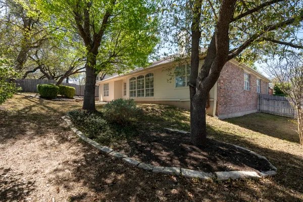 a backyard of a house with lots of green space