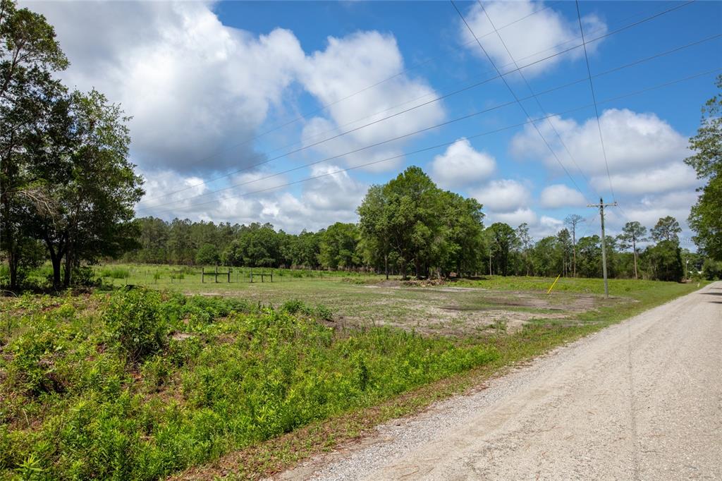 Northwest 185th Street Starke, FL 32091 - Photo 15 of 19 a view of a golf course with green space