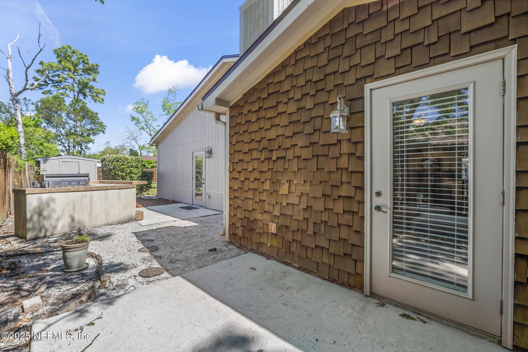 12638 Agatite Road Jacksonville, FL 32258 - Photo 65 of 87 Family room Exterior door