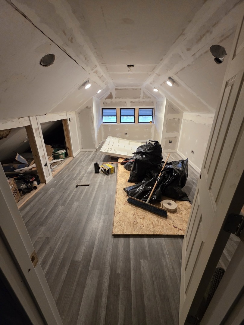 9250 South Ada Street Chicago, IL 60620 - Photo 11 of 16 a living room with furniture and a flat screen tv