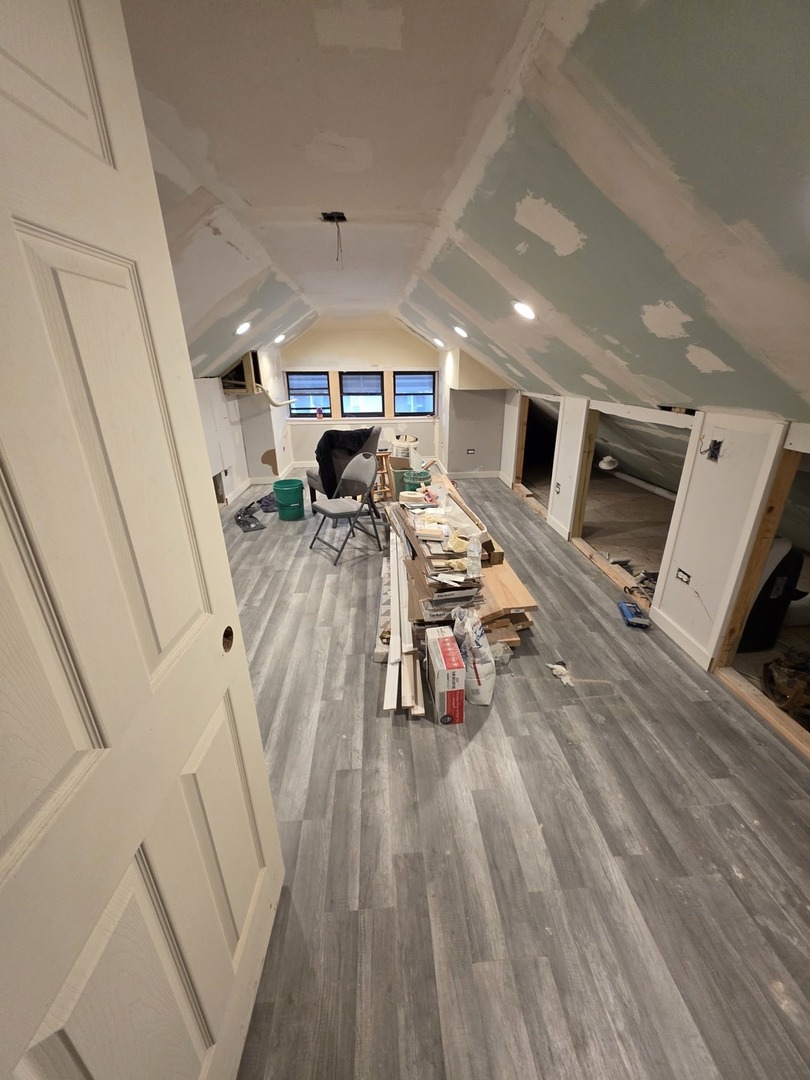 9250 South Ada Street Chicago, IL 60620 - Photo 12 of 16 a living room with furniture and a wooden floor