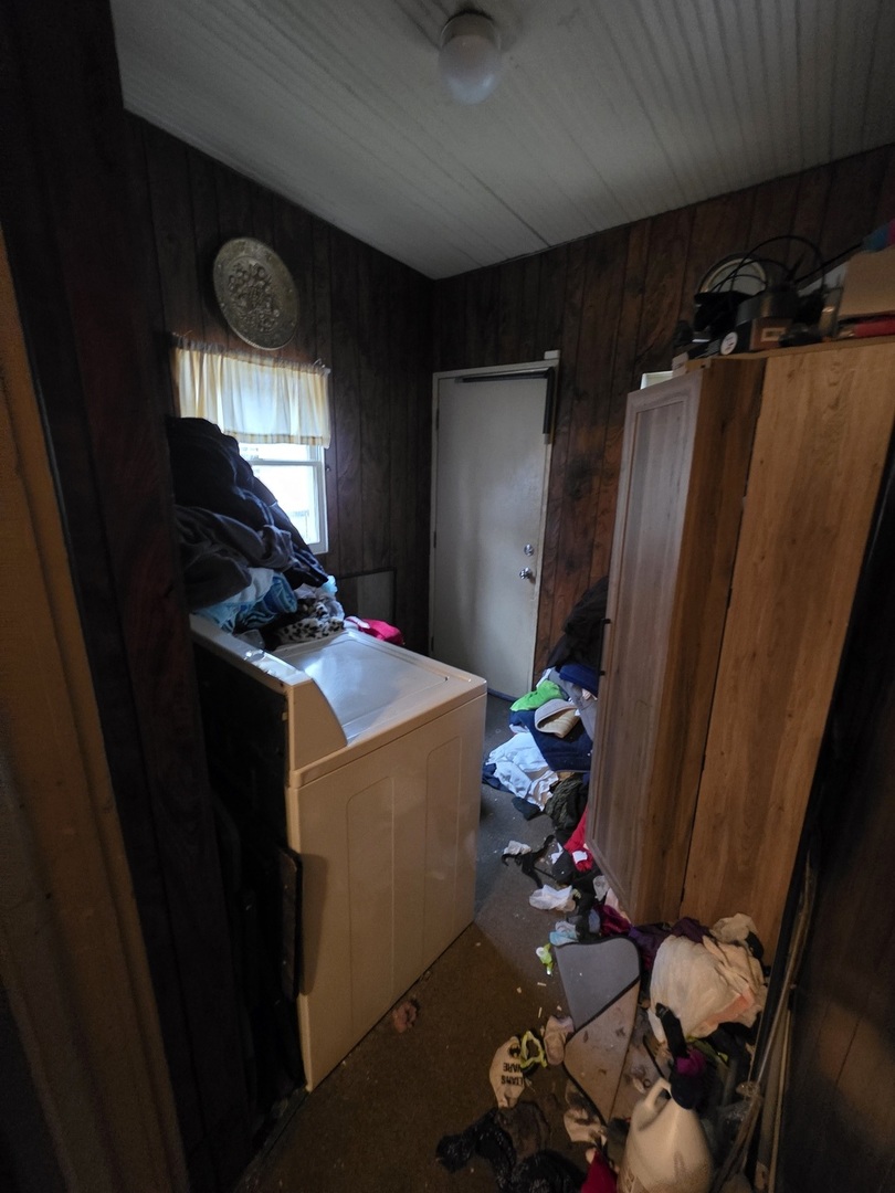 9250 South Ada Street Chicago, IL 60620 - Photo 14 of 16 a kitchen with a refrigerator and a stove