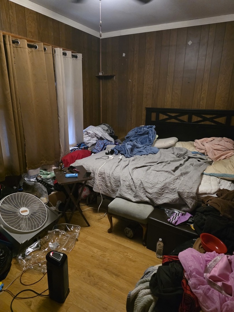 9250 South Ada Street Chicago, IL 60620 - Photo 3 of 16 a bedroom with a bed and a mirror