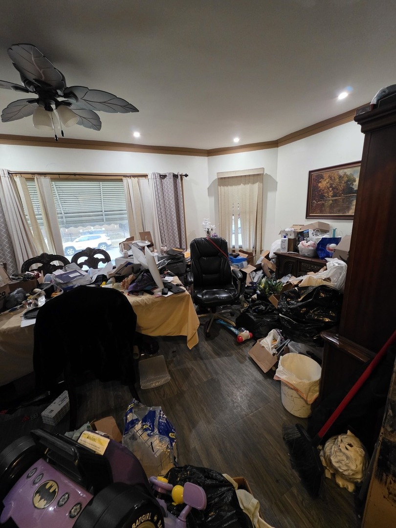 9250 South Ada Street Chicago, IL 60620 - Photo 7 of 16 a bed room with furniture and a window