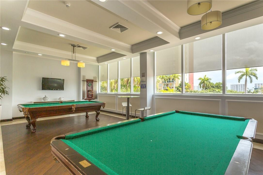16900 North Bay Road, Unit 3514 Sunny Isles Beach, FL 33160 - Photo 16 of 27 a room with pool table and windows