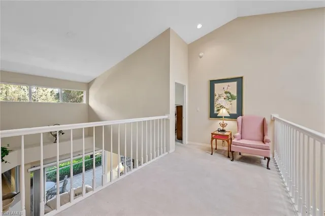 a view of a hallway with workspace