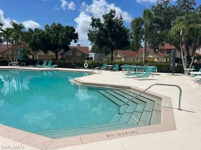 a view of pool and patio