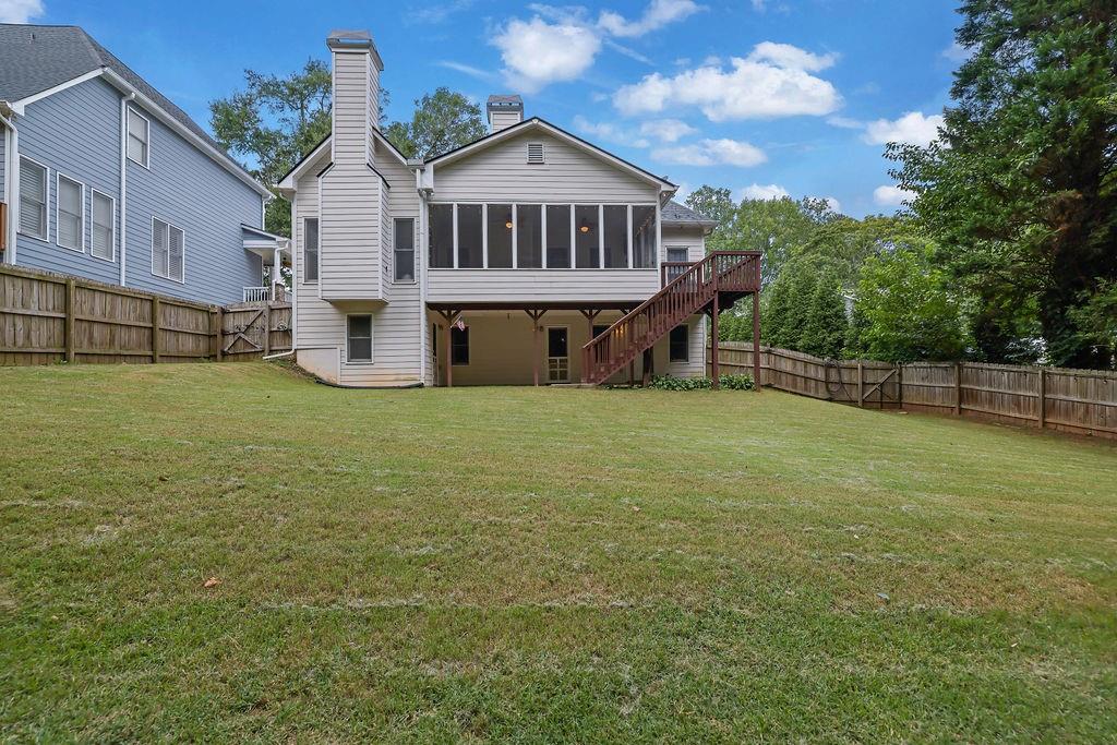 1978 New Kemp Road Marietta, GA 30066 - Photo 40 of 45 a view of a house with a yard and sitting area