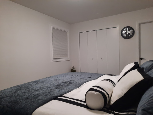 1106 Busse Road Mount Prospect, IL 60056 - Photo 11 of 27 a bedroom with a bed and a painting on the wall