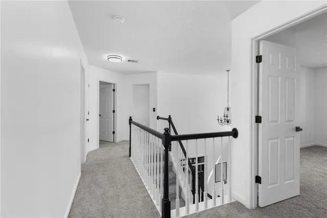 a view of hallway with stairs