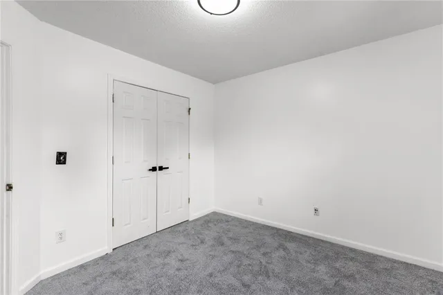 a view of empty room with windows