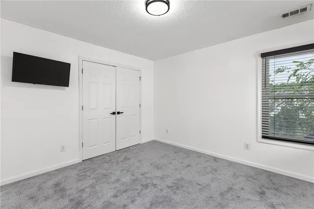 a bathroom with a sink a vanity and a mirror
