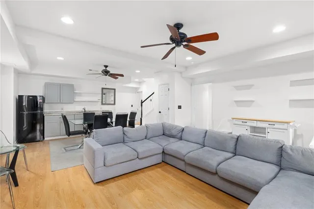 a living room with a couch and a flat screen tv