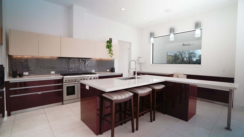 3308 North MacGregor Way Houston, TX 77004 - Photo 19 of 46 Island includes a sink and dishwasher