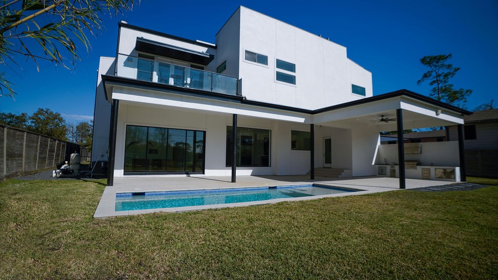 3308 North MacGregor Way Houston, TX 77004 - Photo 3 of 46 Back view of pool and Primary Bedroom balcony