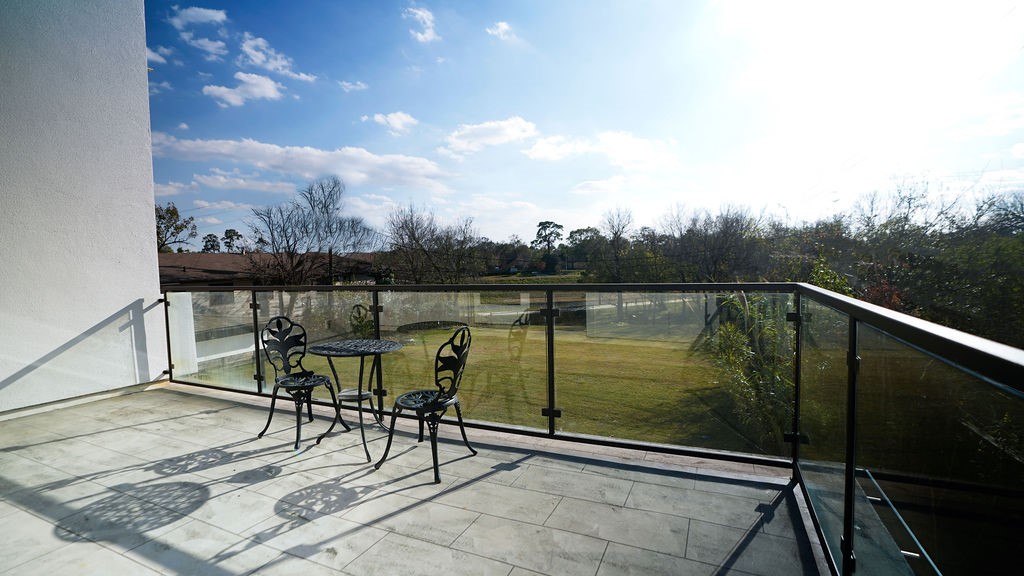 3308 North MacGregor Way Houston, TX 77004 - Photo 6 of 46 Primary bedroom balcony overlooking the expansive backyard