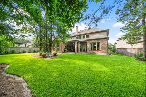 $1,099,000 | 18 Star Iris Place, Tomball, TX 77375