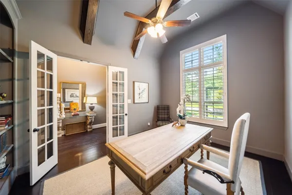 a view of entryway with wooden floor and stairs