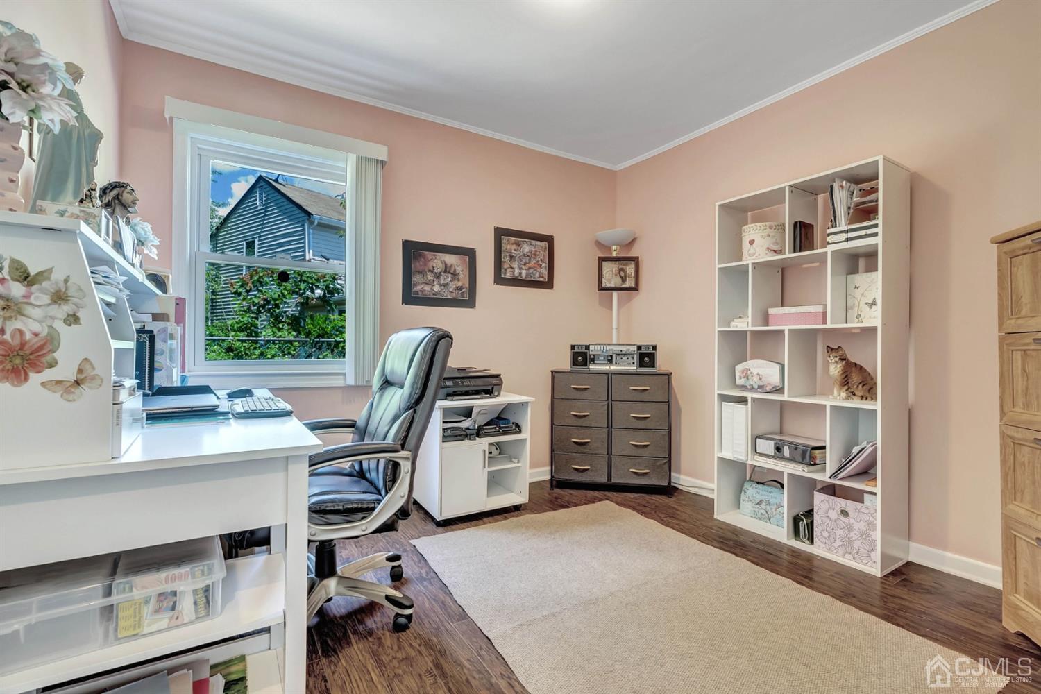 30 West Knollwood Road Edison, NJ 08817 - Photo 5 of 17 a view of a workspace with furniture and a window