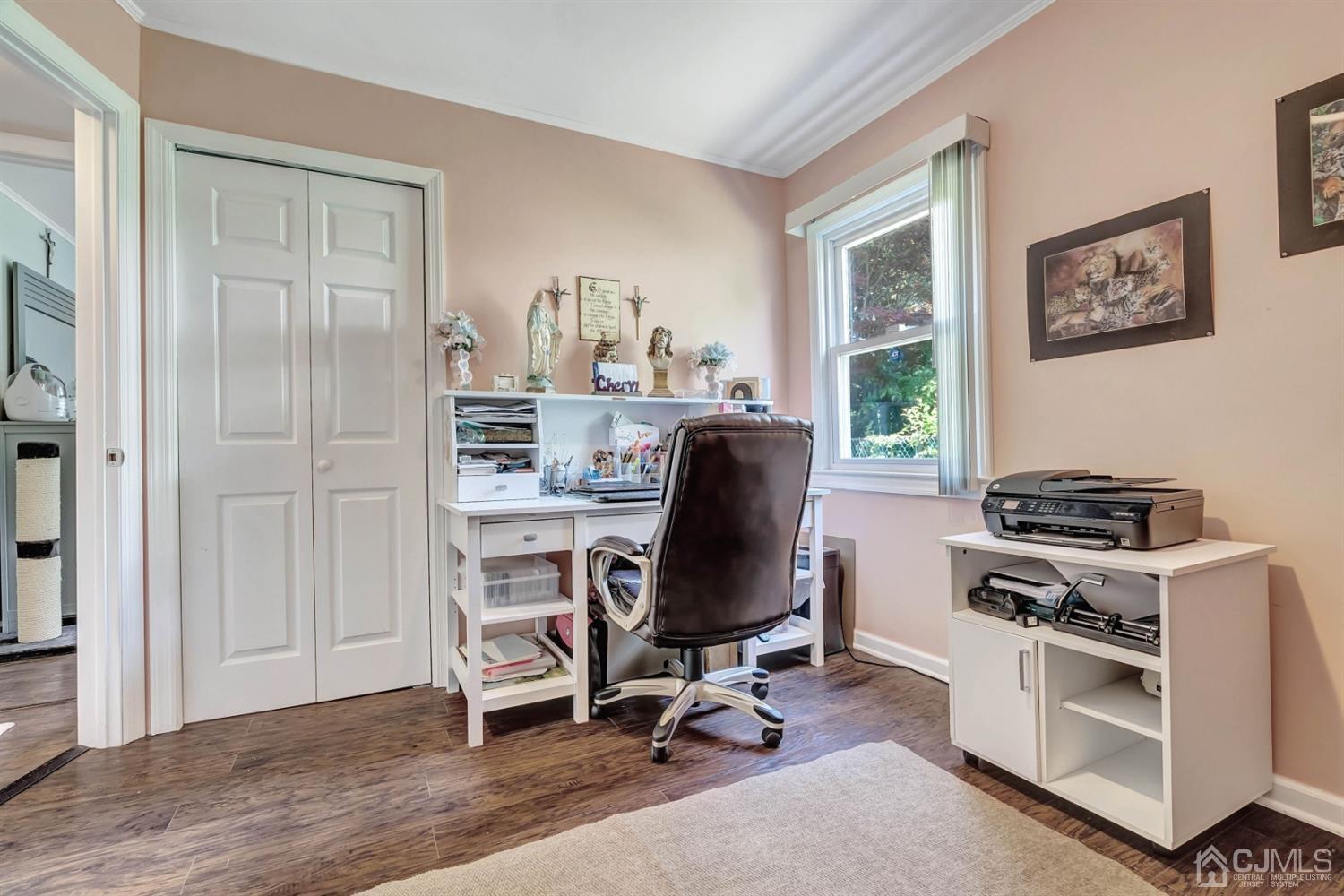 30 West Knollwood Road Edison, NJ 08817 - Photo 6 of 17 a view of a workspace with furniture and a window