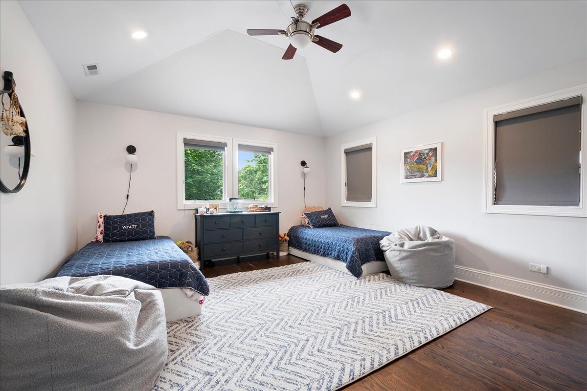 2921 Simpson Street Evanston, IL 60201 - Photo 20 of 41 a bedroom with a bed and window