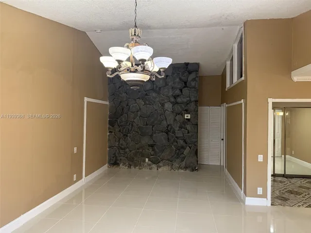 a view of a livingroom with a chandelier