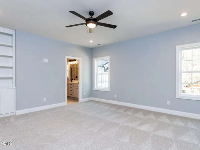 a view of a garage with parked cars